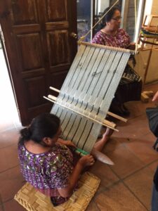 Back strap loom. Huipile wove