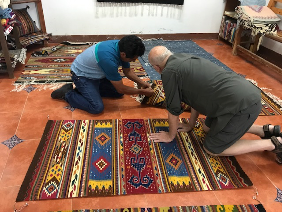 Mayer selecting rugs