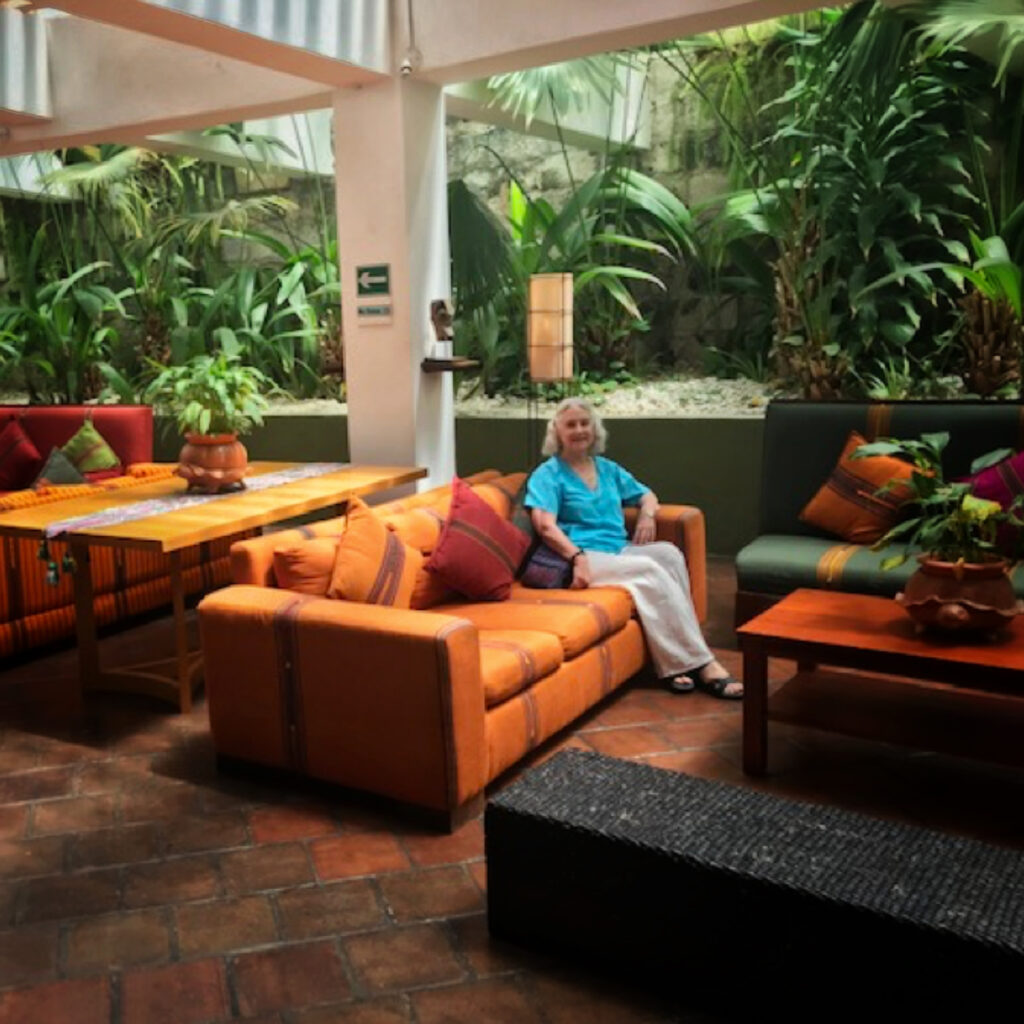 Susan at hotel upholstered chairs