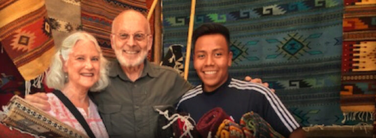 Mayer and Susan with rugs artisan